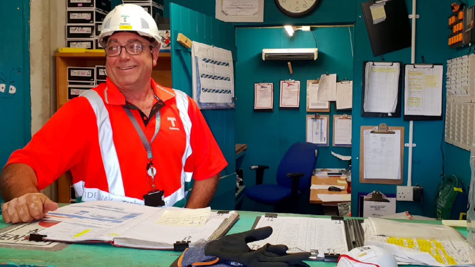 Construction site manager at desk