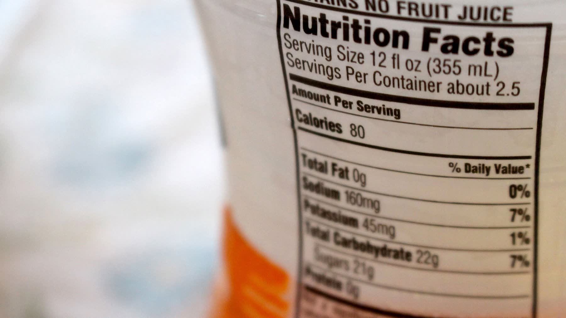 Close-up of nutrition facts label on drinks packaging