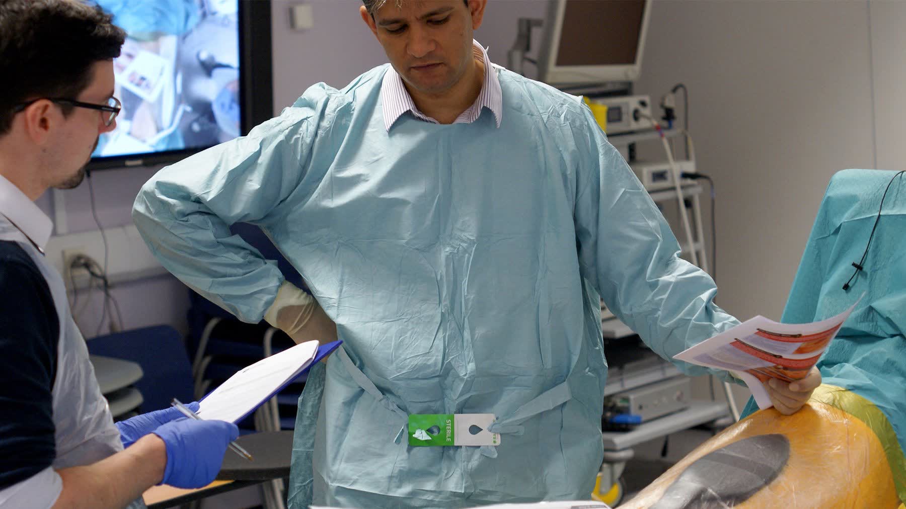 Surgeon with researcher during study session